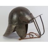 A reproduction '1650s English Civil War Cavalier' helmet.