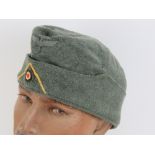 A WWII German Panzer side cap.