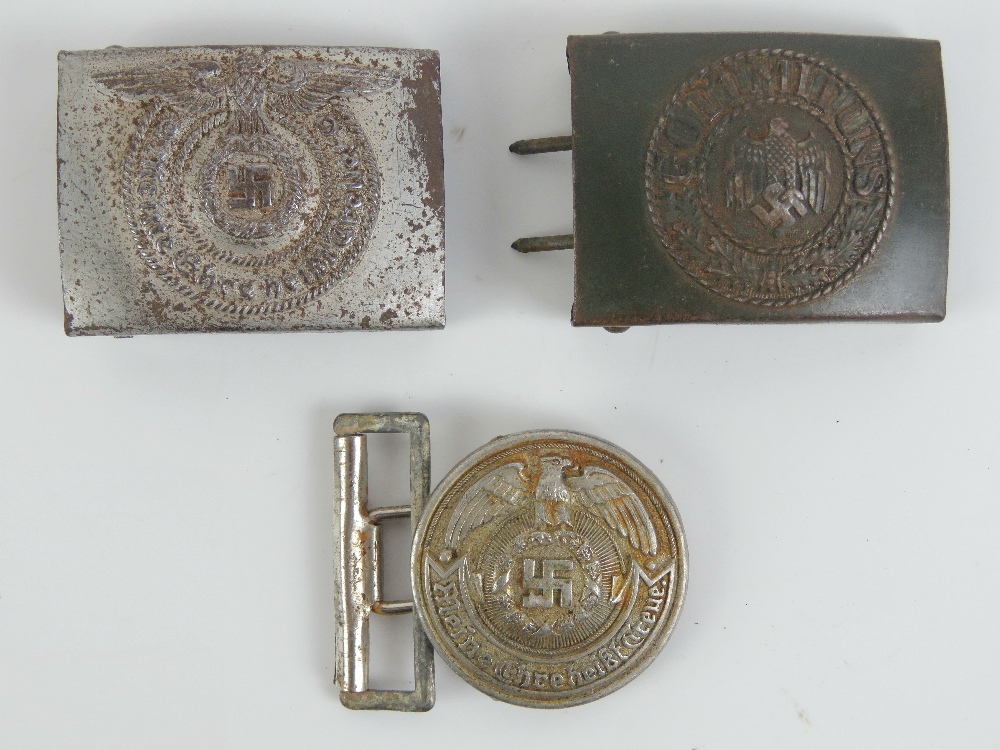 Three German Army buckles being Army, SS and SS Officers each having makers mark to back.