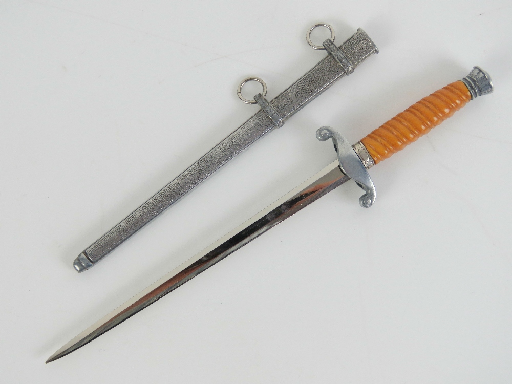 A letter opener in the form of a miniature WWII German Army dagger, marked for E&F Horster Solingen. - Image 3 of 5