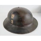 A WWII British Welsh Guards helmet.