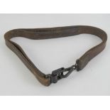 A WWII German MG34 leather sling.