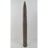 An inert WWII German 4.7cm Pak shell with head having Czech markings upon, 58cm in length.