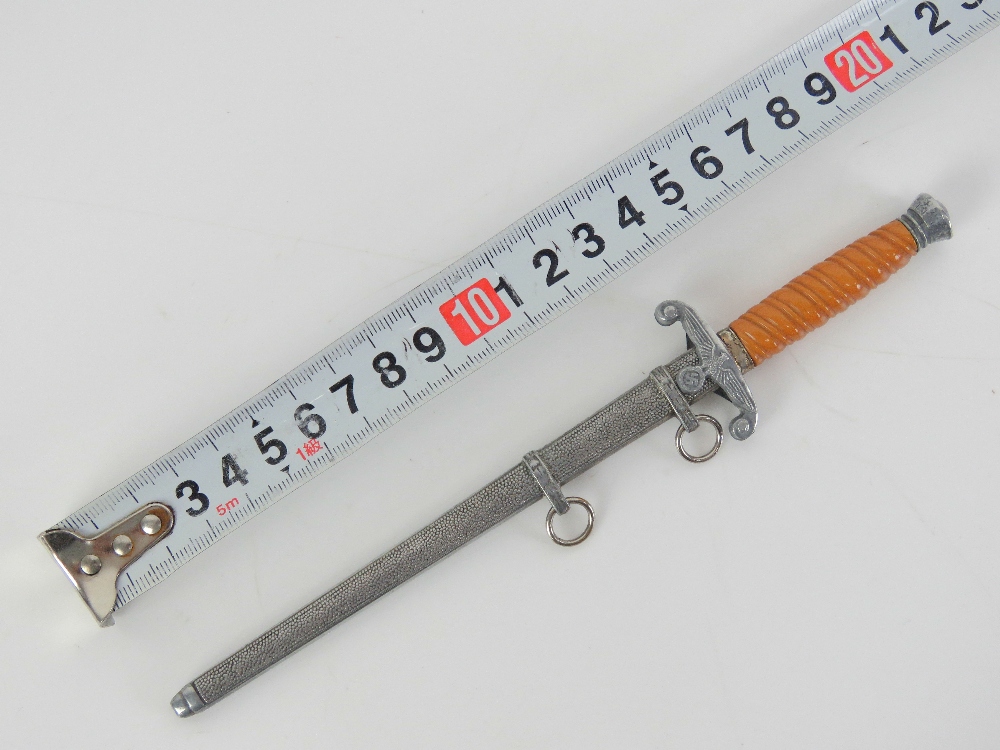 A letter opener in the form of a miniature WWII German Army dagger, marked for E&F Horster Solingen. - Image 2 of 5