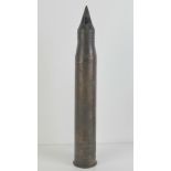 An inert WWII German 5cm Pak armour piercing shell, dated 1943 with German marks upon.