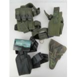 A quantity of assorted holsters including; Web-Tex Beretta M9 shoulder holster,