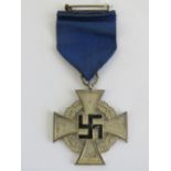 A WWII German 25 Years Faithful Service medal in original box.