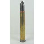 An inert WWII German KWK 38 Panzer shell with head, dated 1937 with german marks upon,
