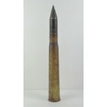 An inert WWII German 47mm shell with head, 56.5cm in length.