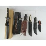 Six assorted knives including; a large hunting knife, four large knives and a tanto style sword.