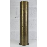 A WWII German 13.5cm shell casing with stencilling down the side, dated 1940 with German marks upon.