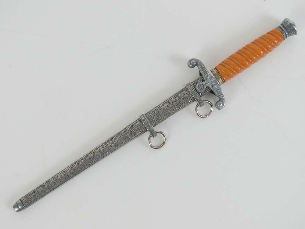A letter opener in the form of a miniature WWII German Army dagger, marked for E&F Horster Solingen.