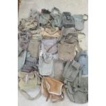 Twenty four assoretd European WWII and later gas mask bags including; French, Polish, SWedish,