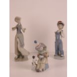 Three assorted Lladro figurines, 15-25cm