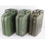 Three 20L 'Jerry' petrol cans, dated 198