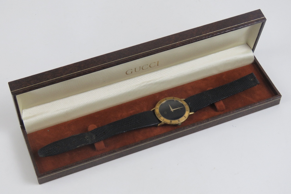 A Gucci wristwatch having yellow metal c - Image 3 of 4