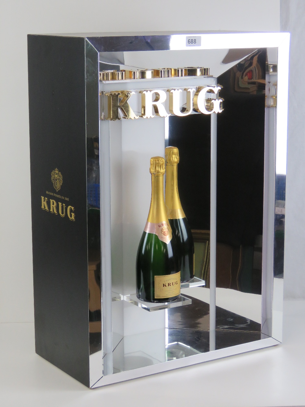 A contemporary illuminated Krug champagn