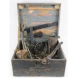 A quantity of assorted ephemera including; WWII era wooden transit case, German gas mask in tin,