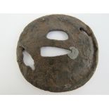 A 16th century Japanese tsuba.