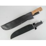 Two large knives with scabbards; Tramontina Brasil and Best Defence 440 steel.