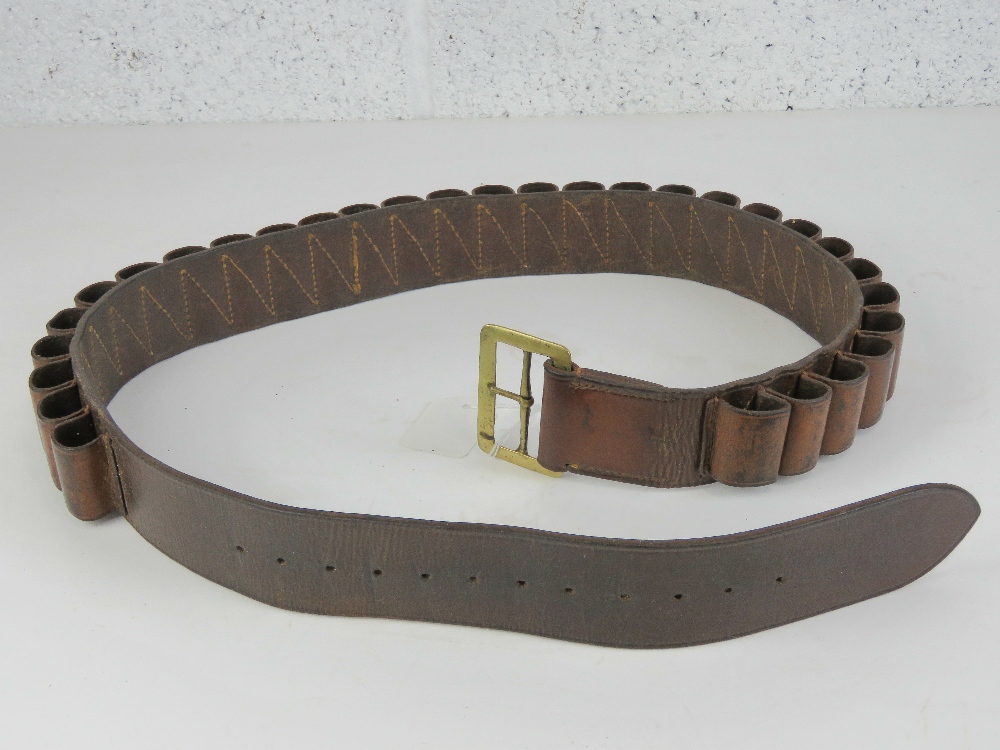 A brown leather shotgun cartridge belt in brown leather with brass buckle. - Image 2 of 2