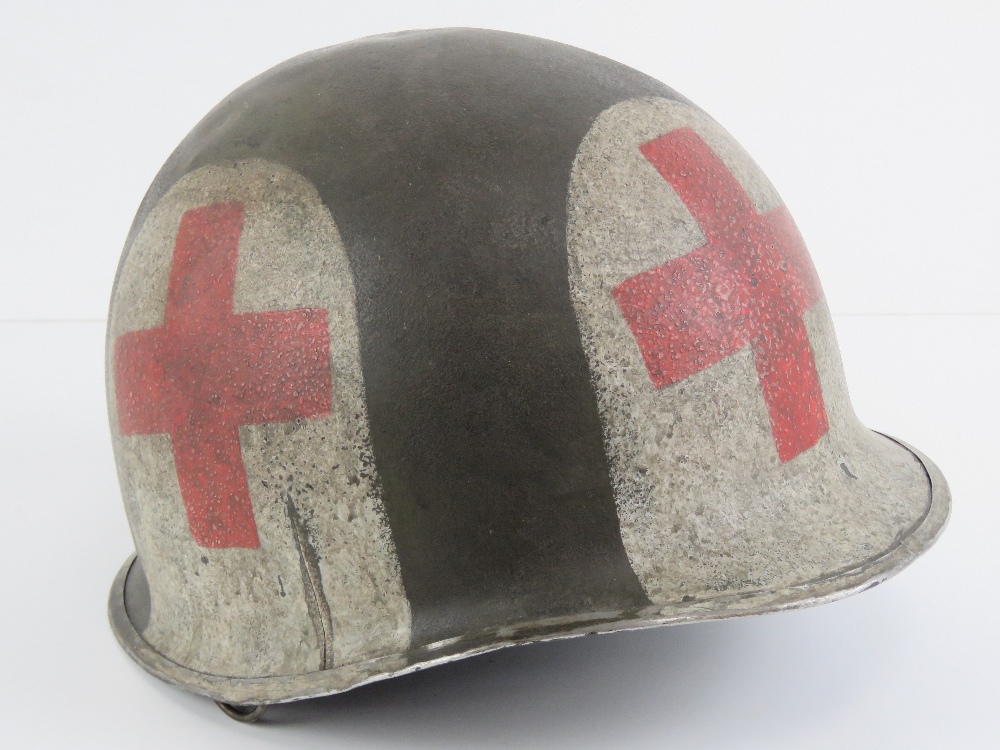 A late WWII US medical helmet.