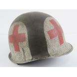 A late WWII US medical helmet.