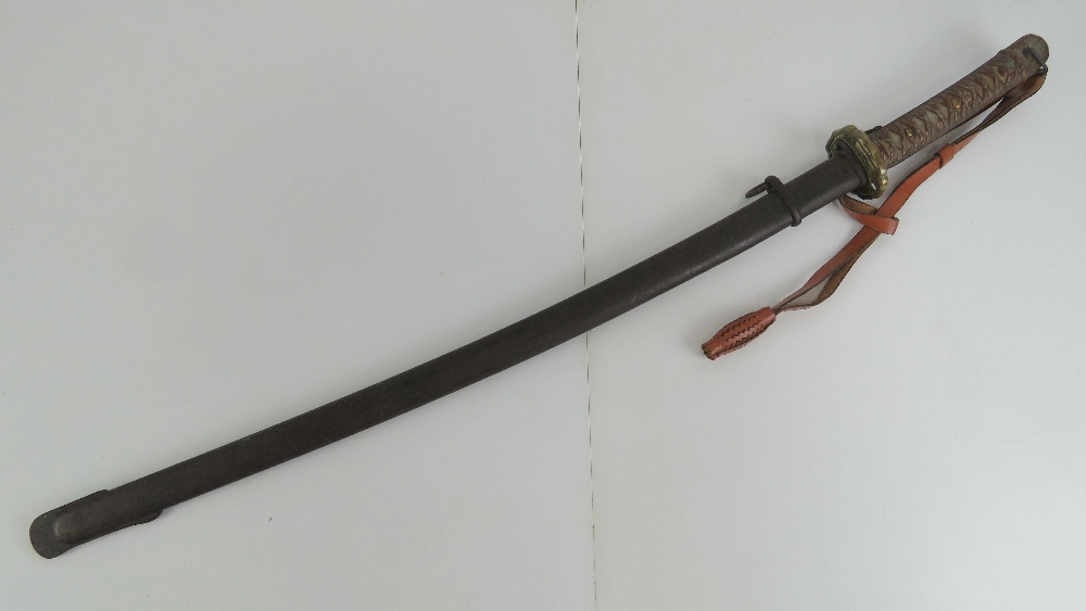 A 1935 Type 95 NCO Katana, with full arsenal markings and stamps,