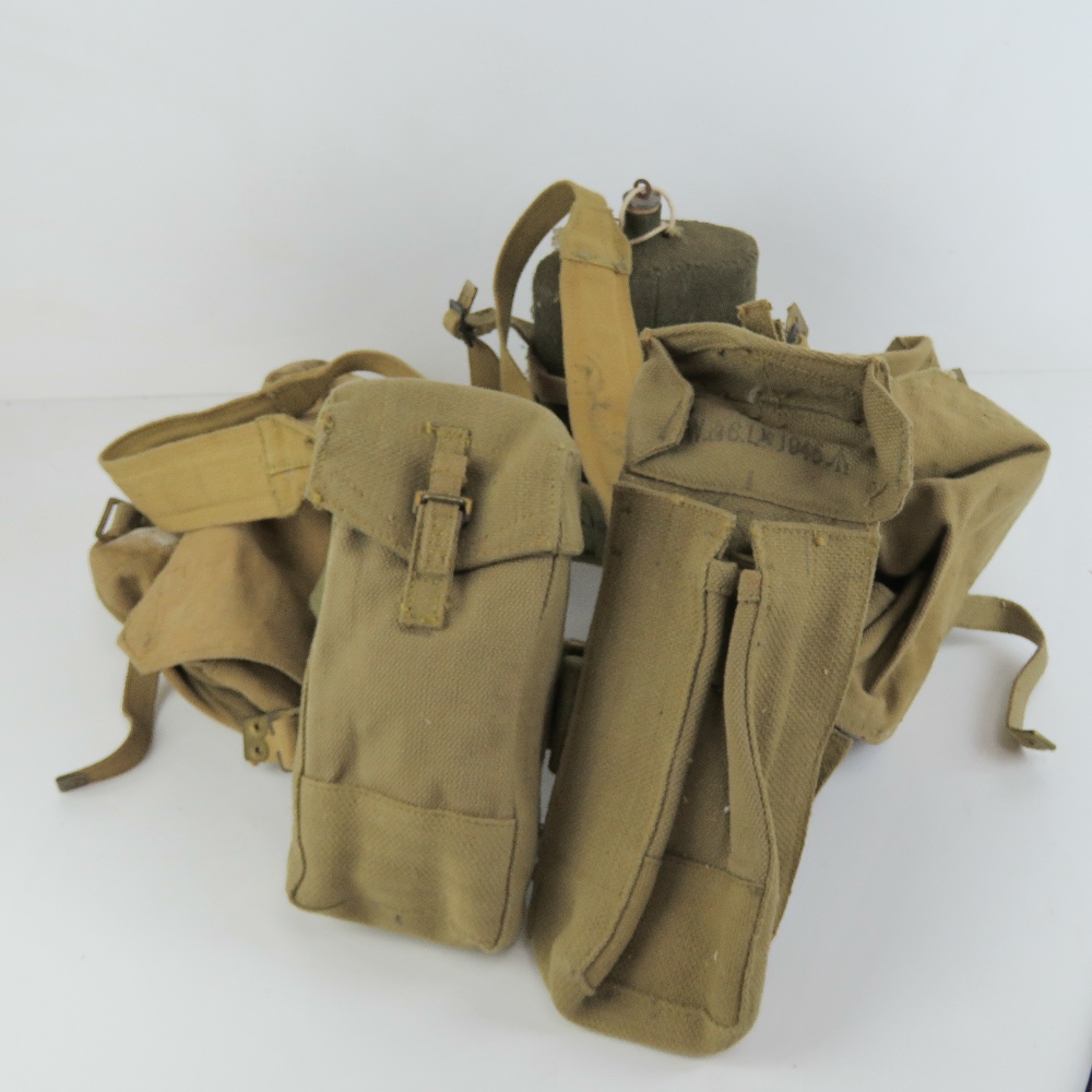 A WWII British 36 pattern webbing set with Bren magazine pouches, water bottle and utility pouches.