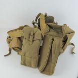 A WWII British 36 pattern webbing set with Bren magazine pouches, water bottle and utility pouches.
