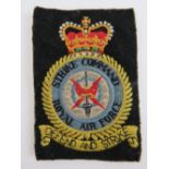 A Strike Command Royal Air Force 'Defend and Strike' embroidered cloth badge, 11 x 8cm.