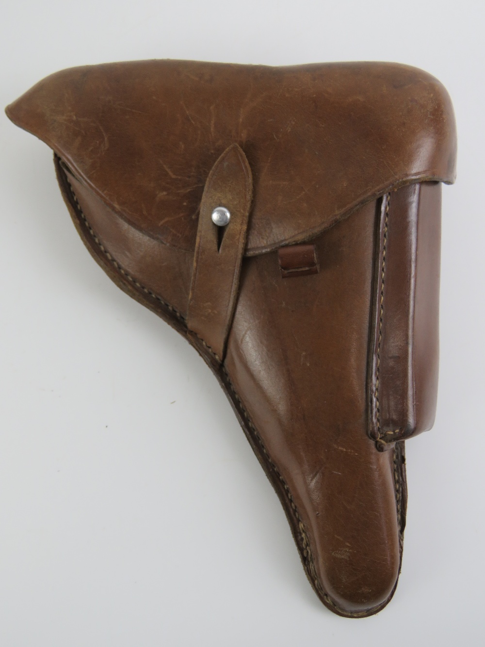 A WWII German P08 Luger holster, having German marks upon and dated 1940.