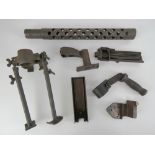 A WWII A6 Browning 30 cal conversion kit, consisting of 7 parts.