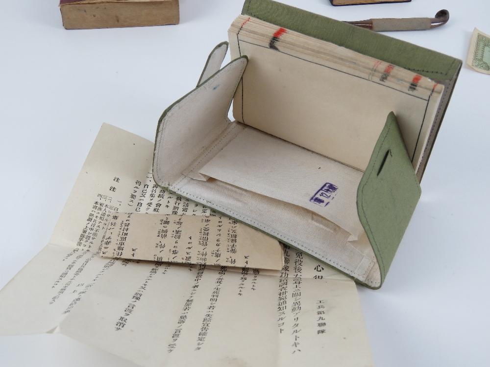 A set of Japanese soldiers pay books and technical manuals with 2 pieces of paper money and - Image 4 of 7