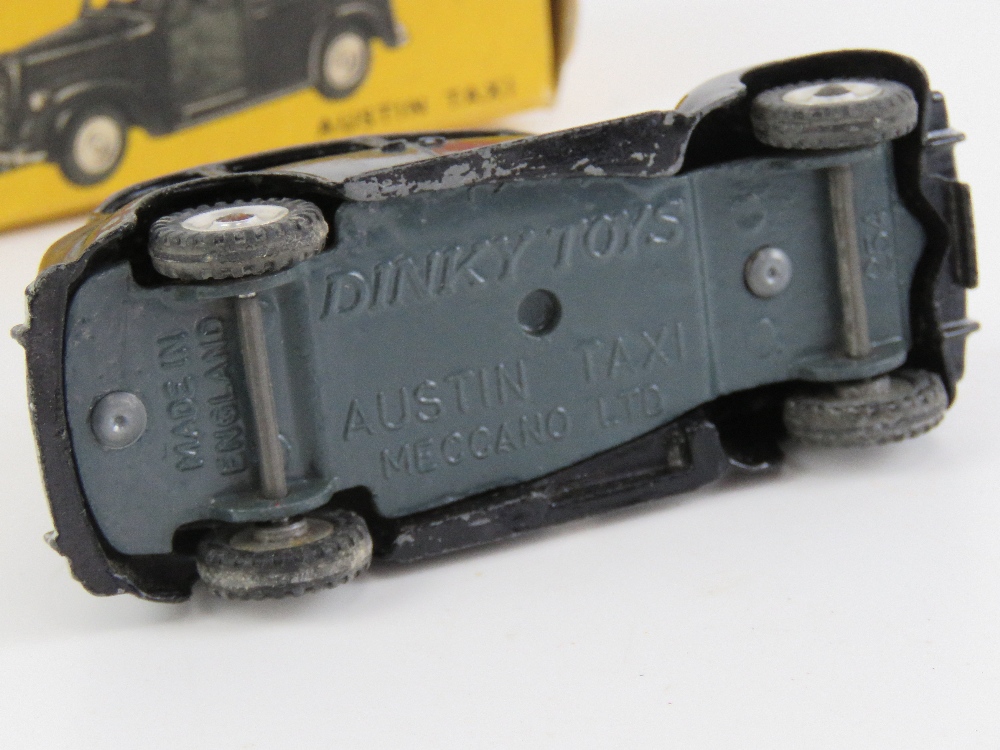 A Dinky Toys Austin Taxi No254, together with a Cogri Toys Taxi No418. Two items in original boxes. - Image 8 of 9