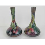 Dutch Art Nouveau vases: a pair of Gouda 237/287 & 237/280 colourful stem vases,