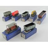A quantity of Hornby Dublo 00 gauge wagons including oil wagon, open wagon, mineral wagon,