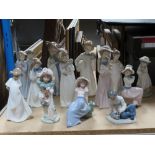 Thirteen assorted Nao figurines 12-25cm high.