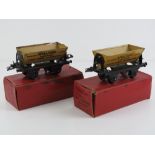 Two Hornby trains 0 gauge number one side tipping wagons, with original boxes.