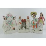 Three 19th century Staffordshire flatback figurines each being of a man and a woman,