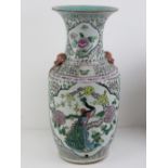 A large and impressive Chinese famille rose open necked shoulder vase in pinks and greens decorated