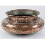 A heavy Middle Eastern copper plated planter having engraved pattern upon, approx 28cm dia.