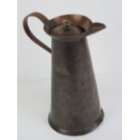 Art Nouveau: a hand made late 19th century hinge lidded copper hot water jug with riveted handle