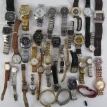 A large quantity of assorted men's and ladies wristwatches.