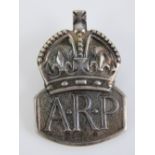 A HM silver ARP lapel badge, hallmarked London 1938.