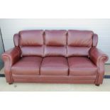 A three seater leather sofa,