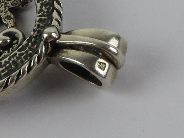 A HM silver 'open locket' having pierced floral panels to front and back, opening at bale, 4. - Image 3 of 3