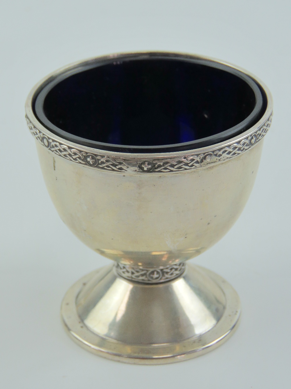 A HM silver raised pedestal salt with Bristol blue glass liner,