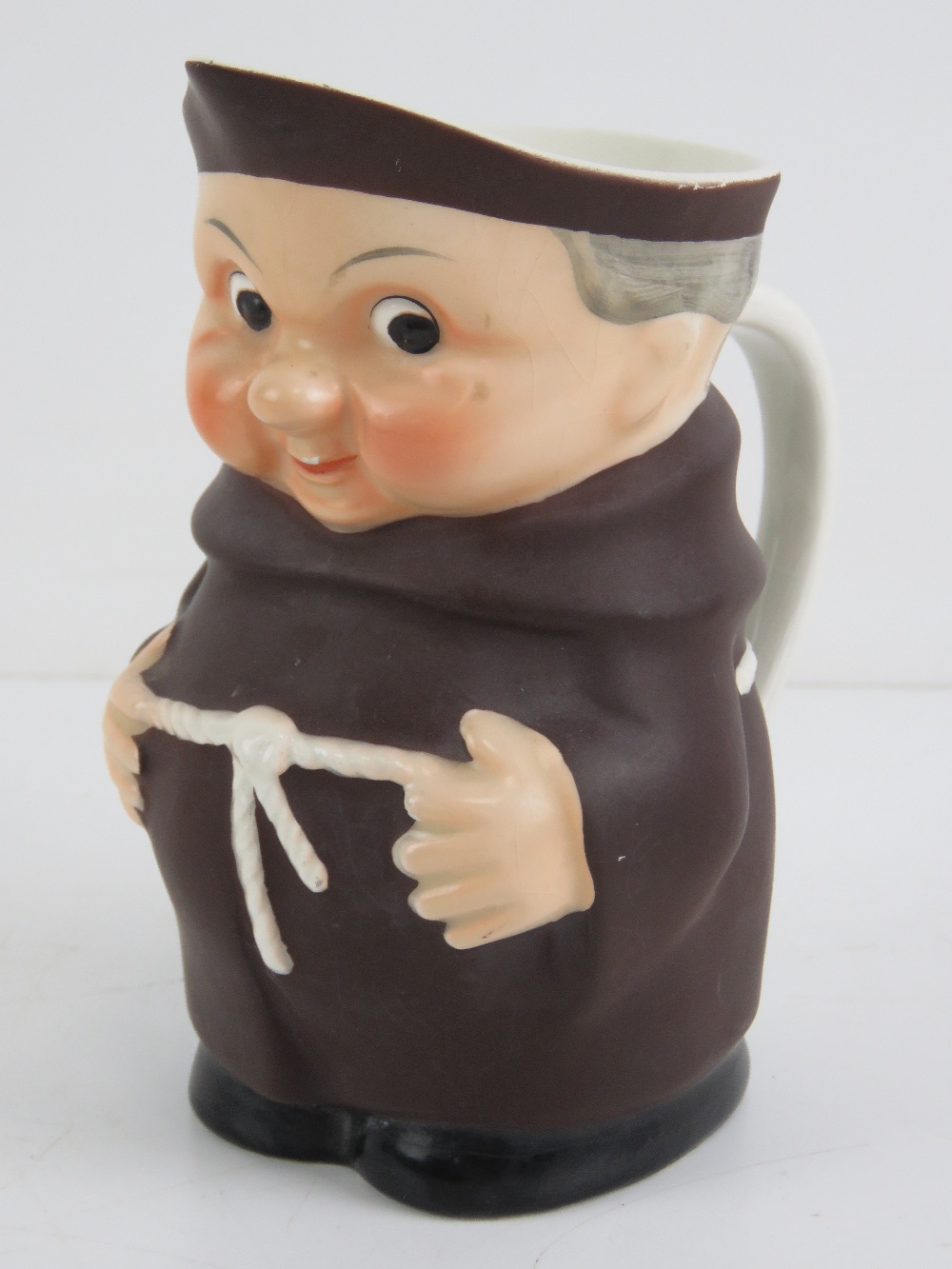 A Goebel West Germany pottery jug in the form of a friar, 14.