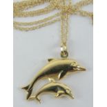 A 9ct gold fine chain, stamped 375, having dolphin pendant upon, no apparent hallmarks,